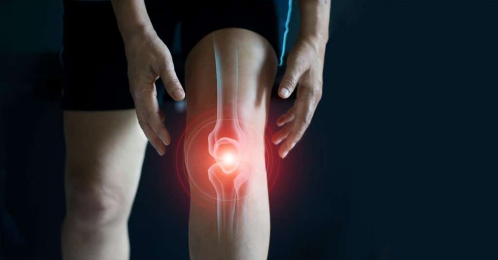 Elderly woman suffering from pain in knee. Tendon problems ...